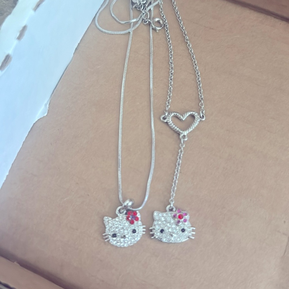 Two Hello Kitty Necklaces